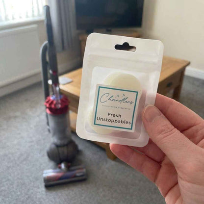 Scented vacuum freshener discs for cleaning, suitable for many bagged and bagless vacuums with space near the filter.