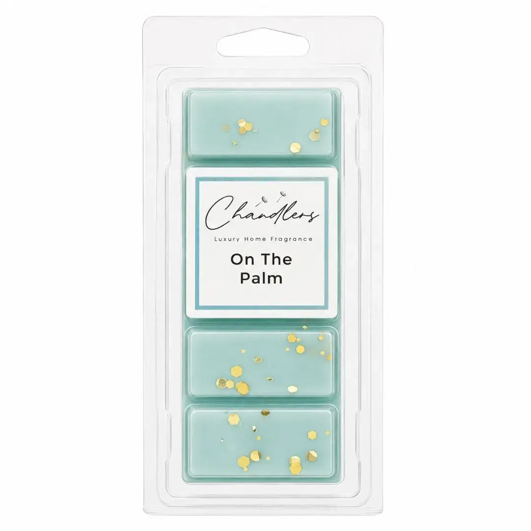 On The Palm luxury dubai wax melts in pale aqua wax with gold glitter by Chandlers