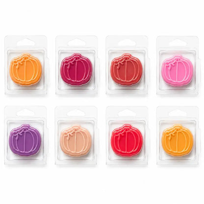 Pumpkin shaped wax melts in individual clear clamshells by Chandlers Wax Melts, colourful autumn home fragrance melts.